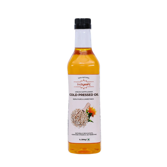 Bottle of Indiyeah cold pressed oil on a white background